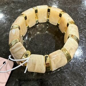 Elegant Gold and Cream Bracelet